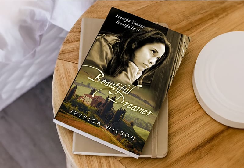 A book sitting on top of a wooden table.