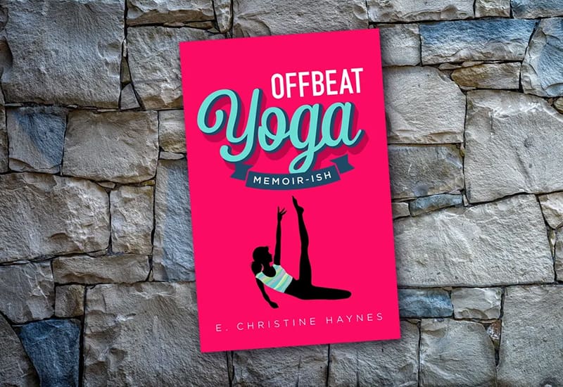 A book cover with a woman doing yoga on the ground.