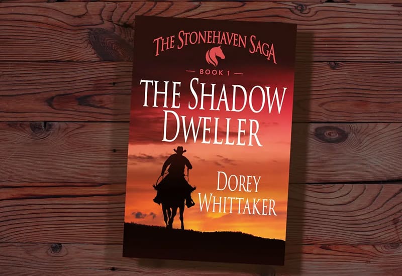 A book cover with the title of the shadow dweller.