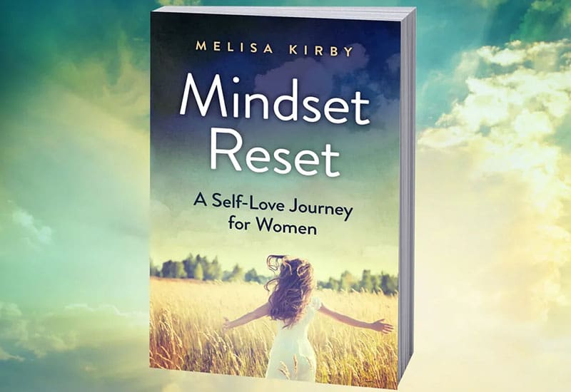 A book cover with a woman in the background.
