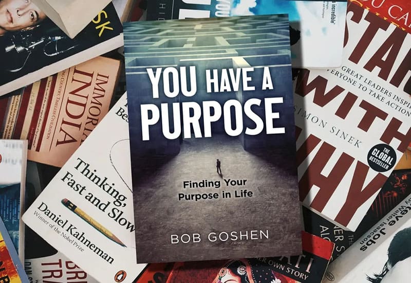A book sitting on top of some papers.