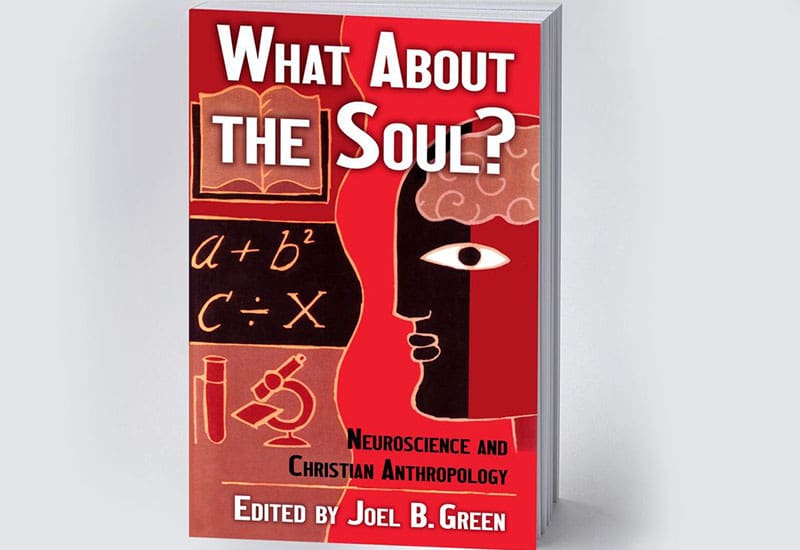 A book cover with an image of two faces.