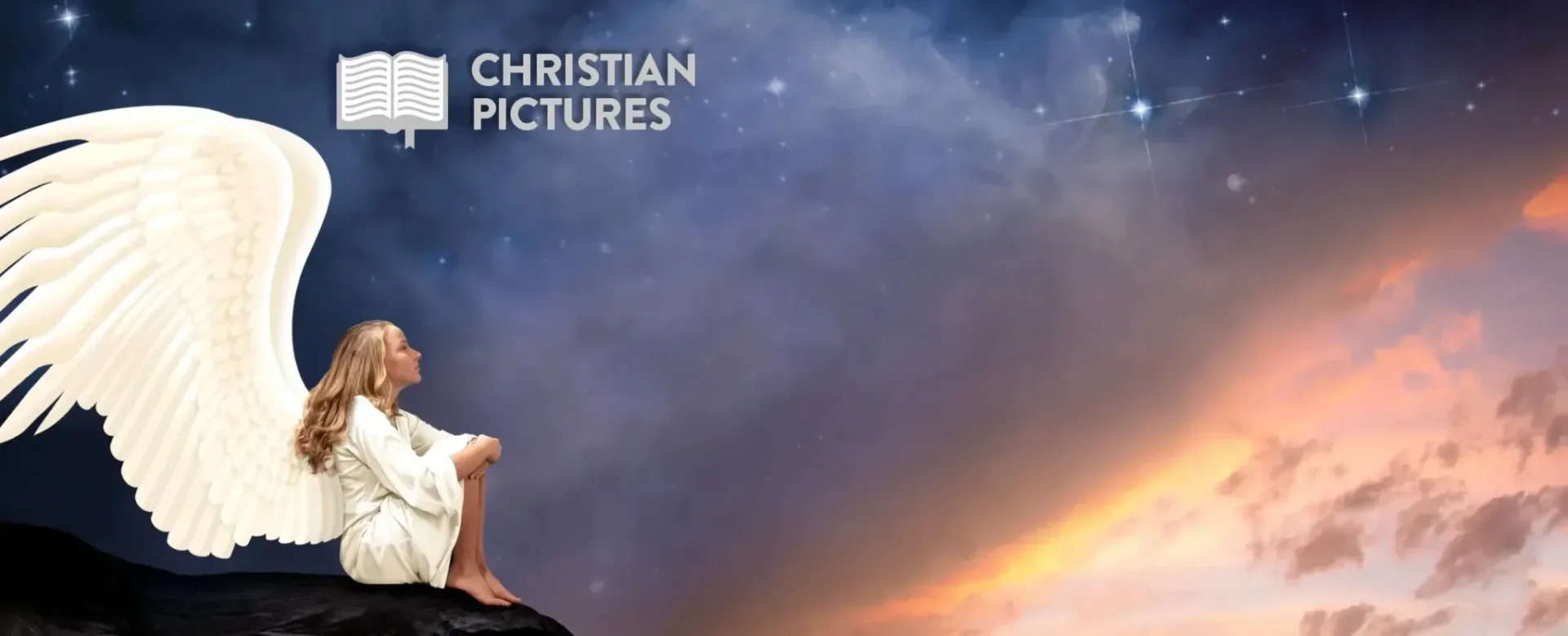 A person sitting on top of a rock in front of the sky.