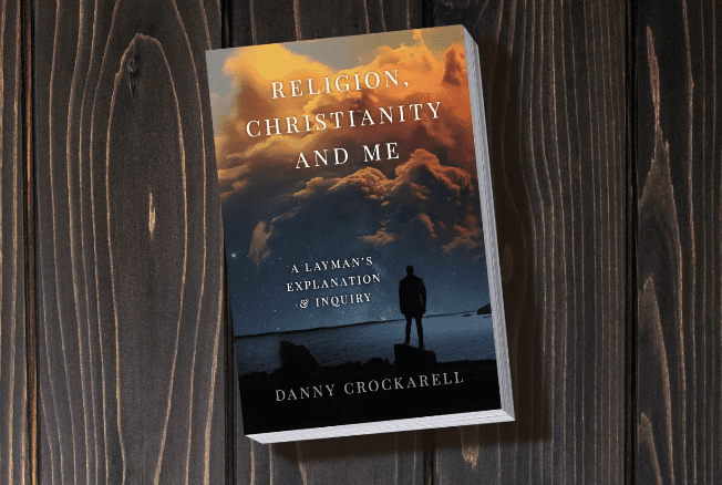 A book cover with a person standing on top of it.